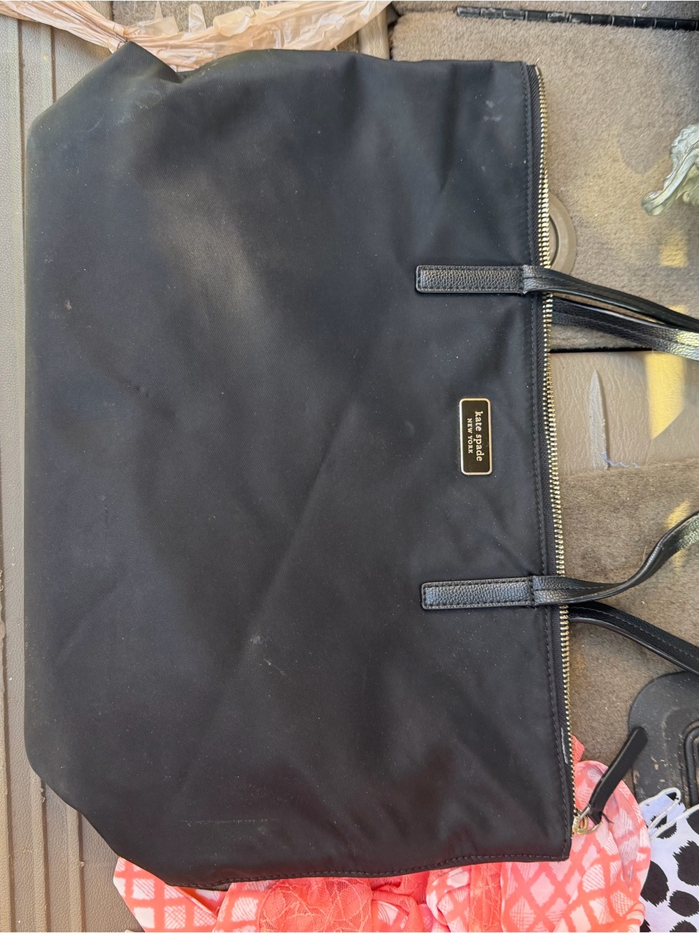 kate spade black nylon tote with gold-tone plaque